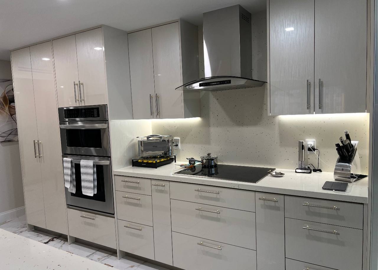 High-gloss modern kitchen with under-cabinet LED lighting